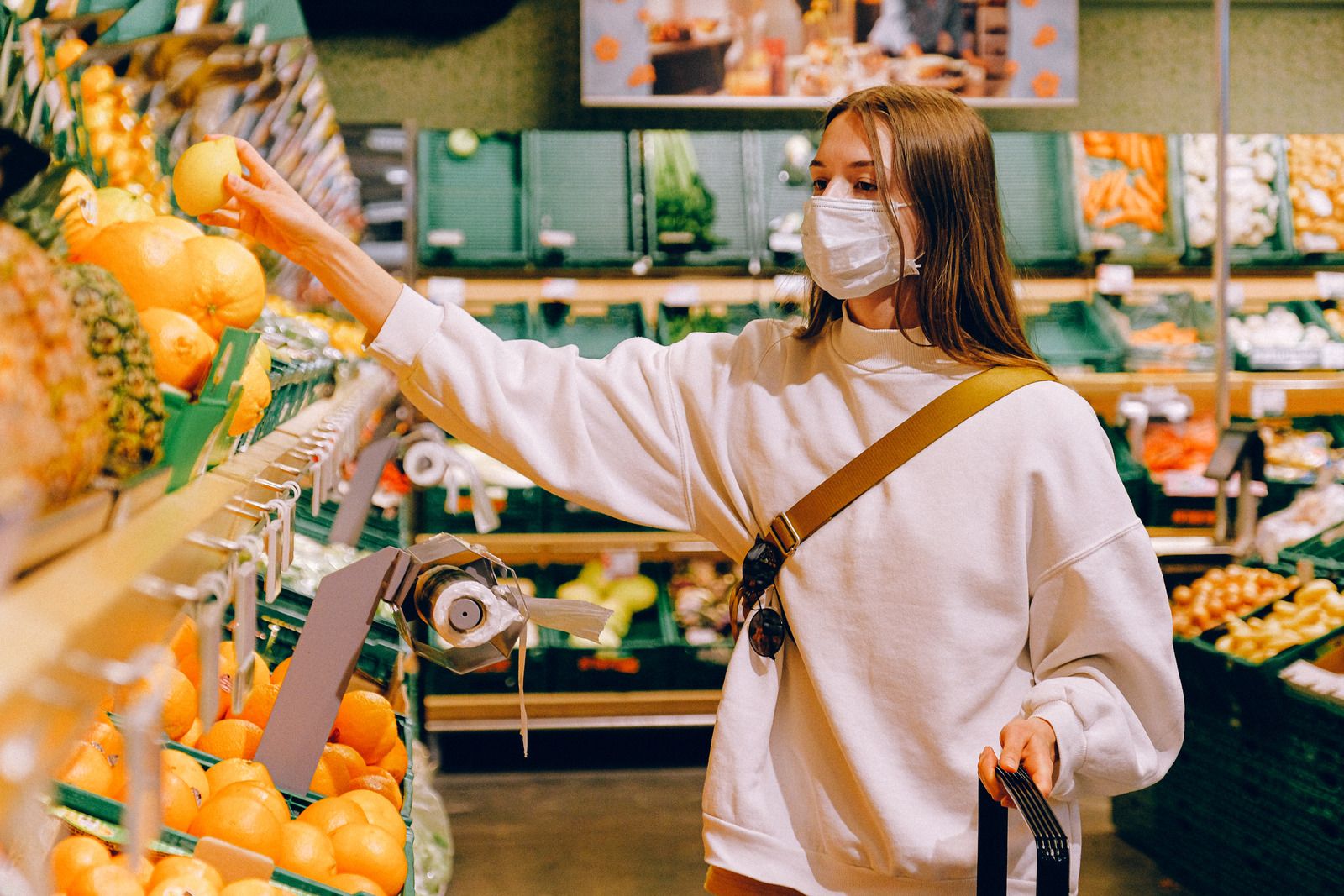 Canva Woman Wearing Mask in Supermarket