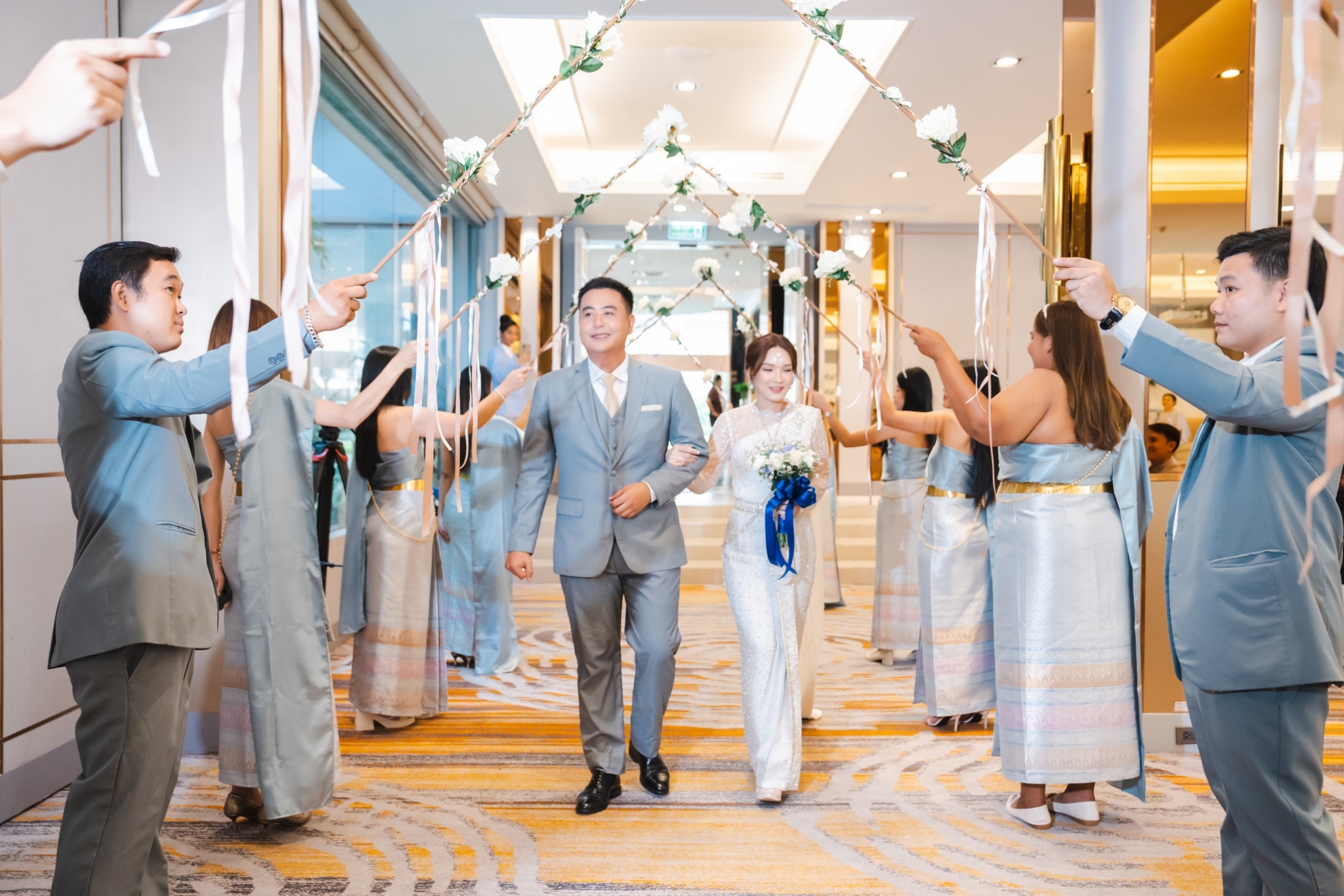 ลอดซุ้มประตู งานแต่งคุณบูมและคุณทราย